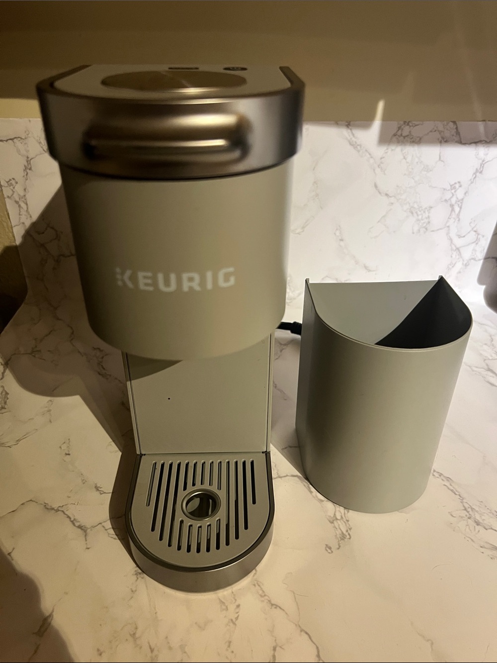 Keurigk mini plus Single-Serve Coffee Maker in Light Gray compact size